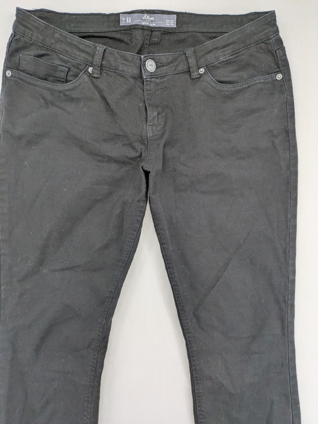 s.Oliver black slim fit jeans with low rise and classic design details.