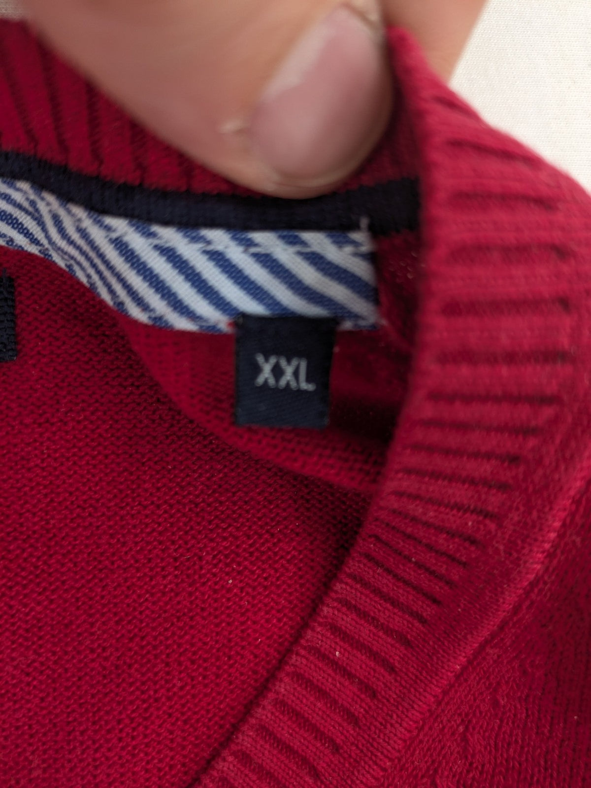 McNeal red turtle neck jumper V-neck design with ribbed cuffs and hem.