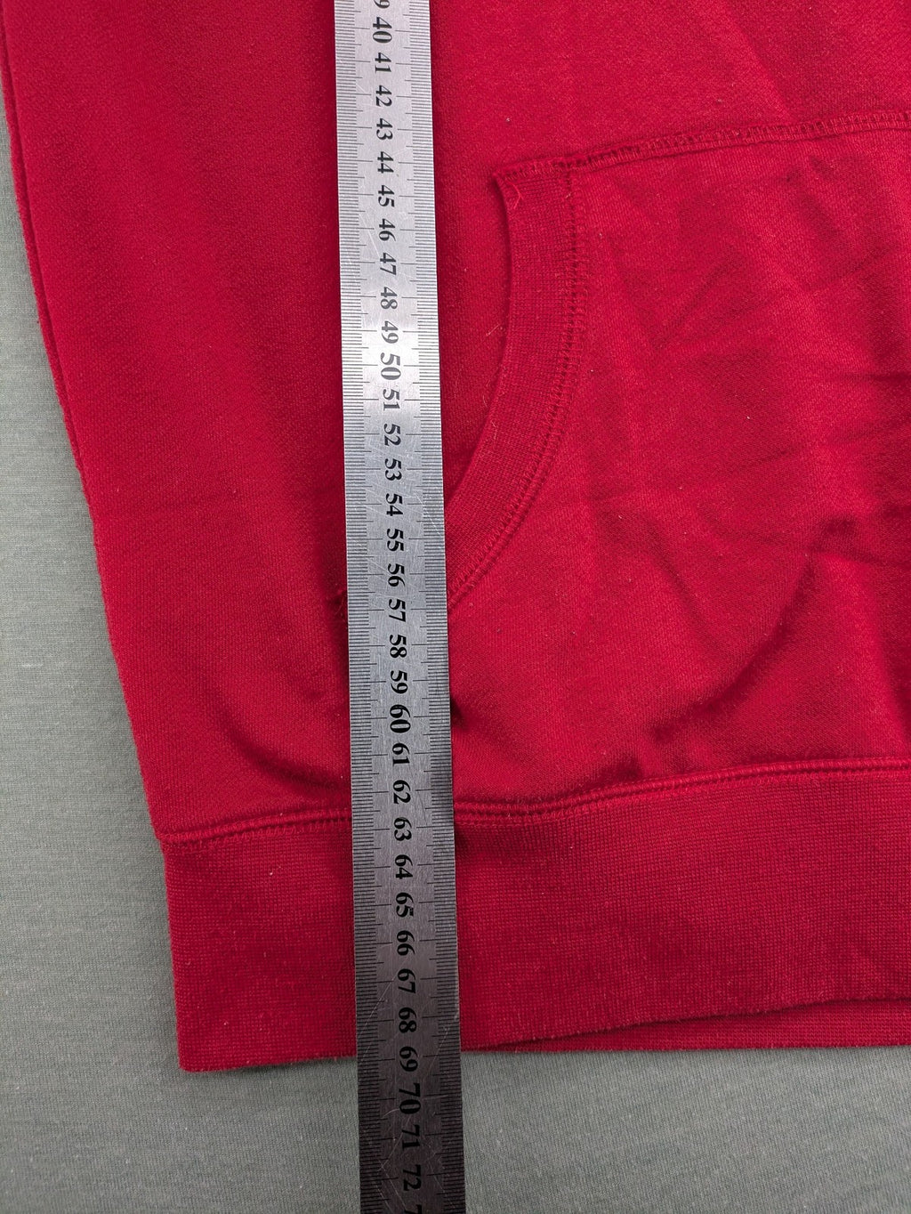 Sparks red zip-through hoodie with New York graphic print and grey hood.