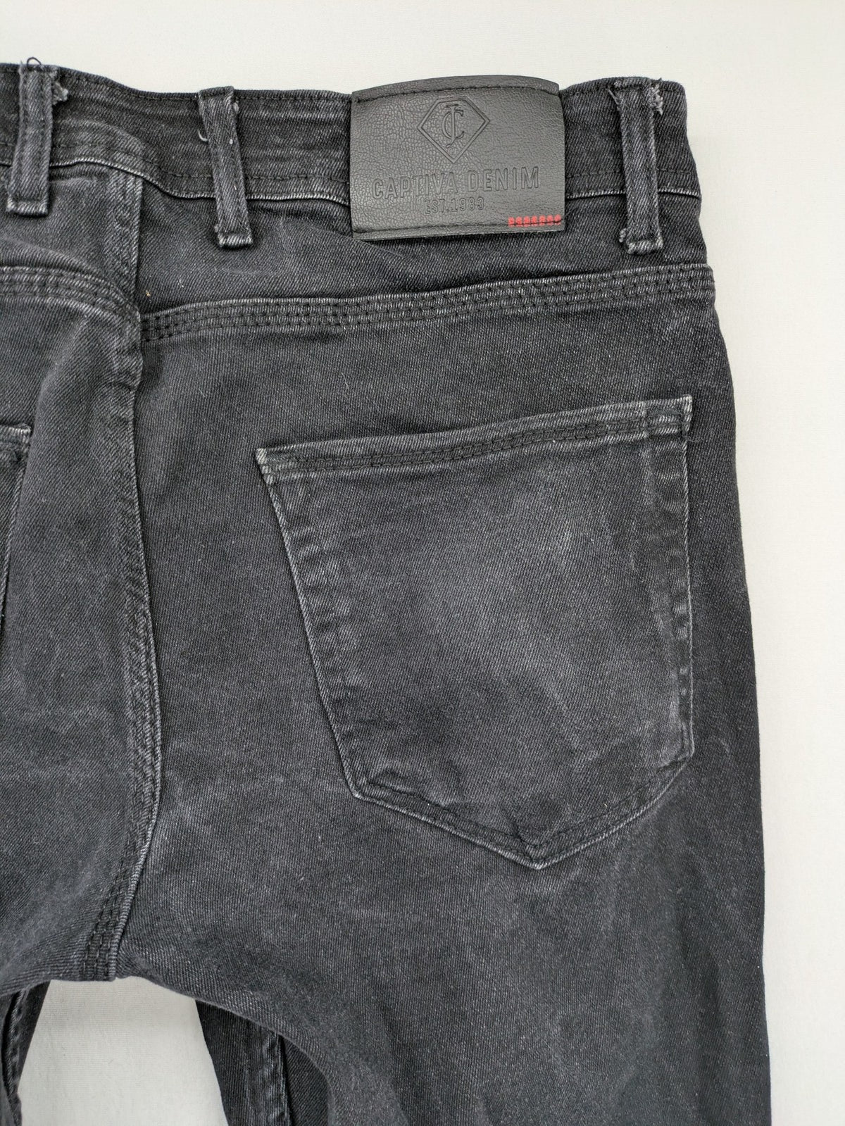 Captiva Jeans black straight jeans, classic five-pocket style, button fly, washed denim.