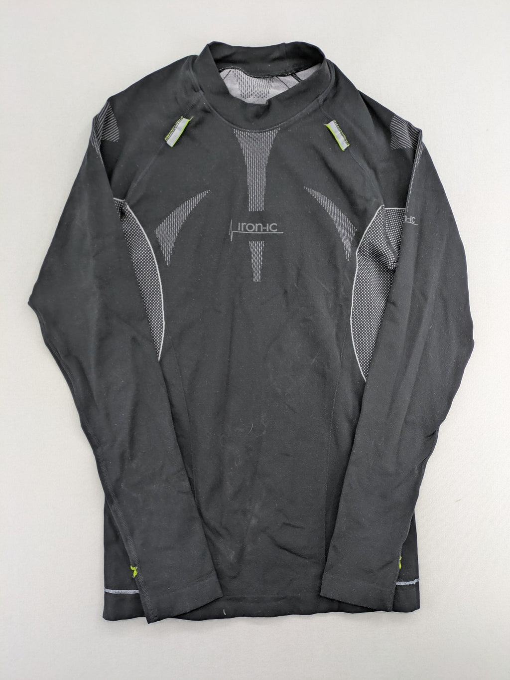 Iron-ic black long sleeve baselayer top with standing collar and thumbholes.