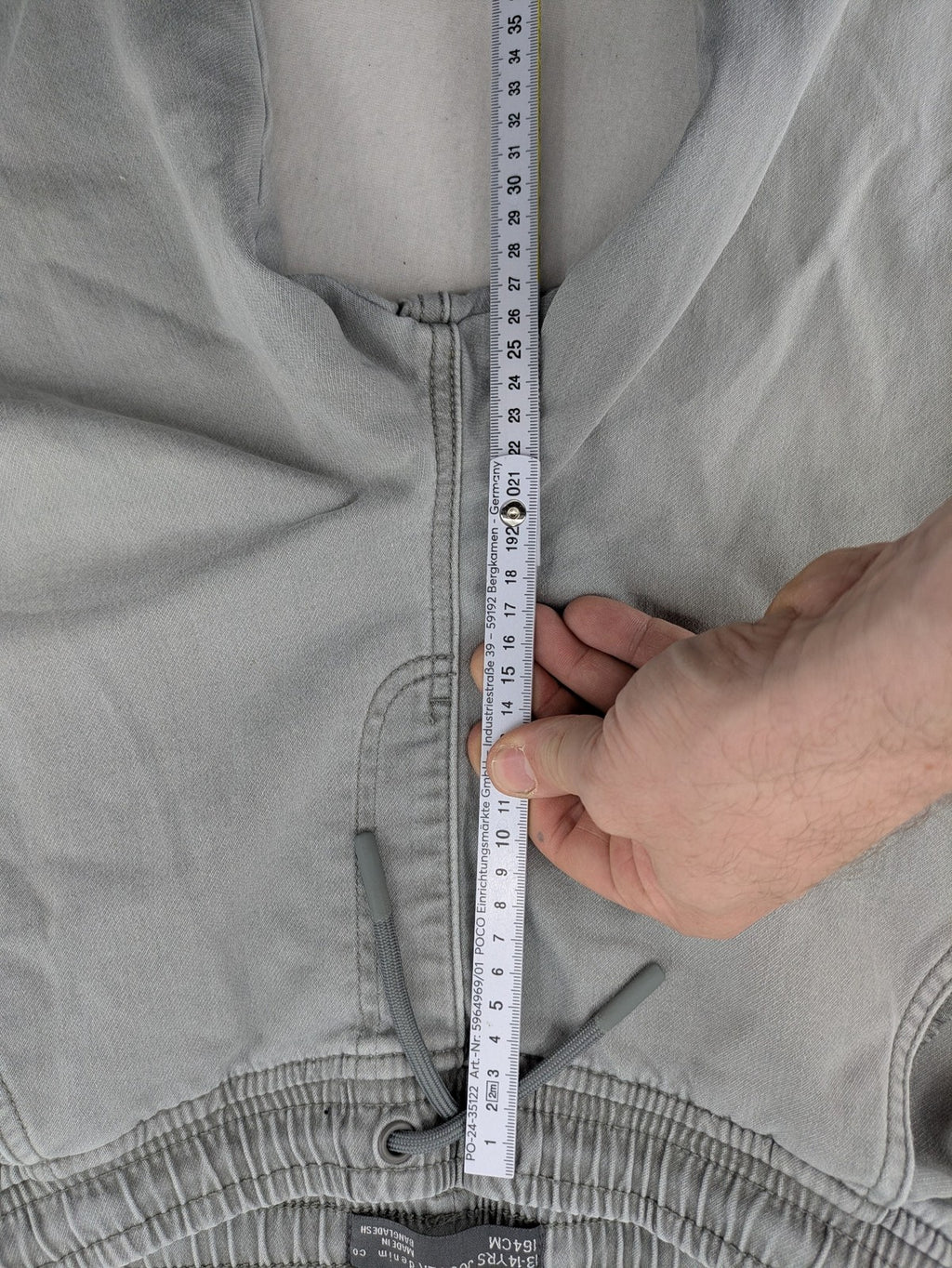 Denim & Co. grey jogger jeans with elastic waistband and ankle cuffs, cotton material.