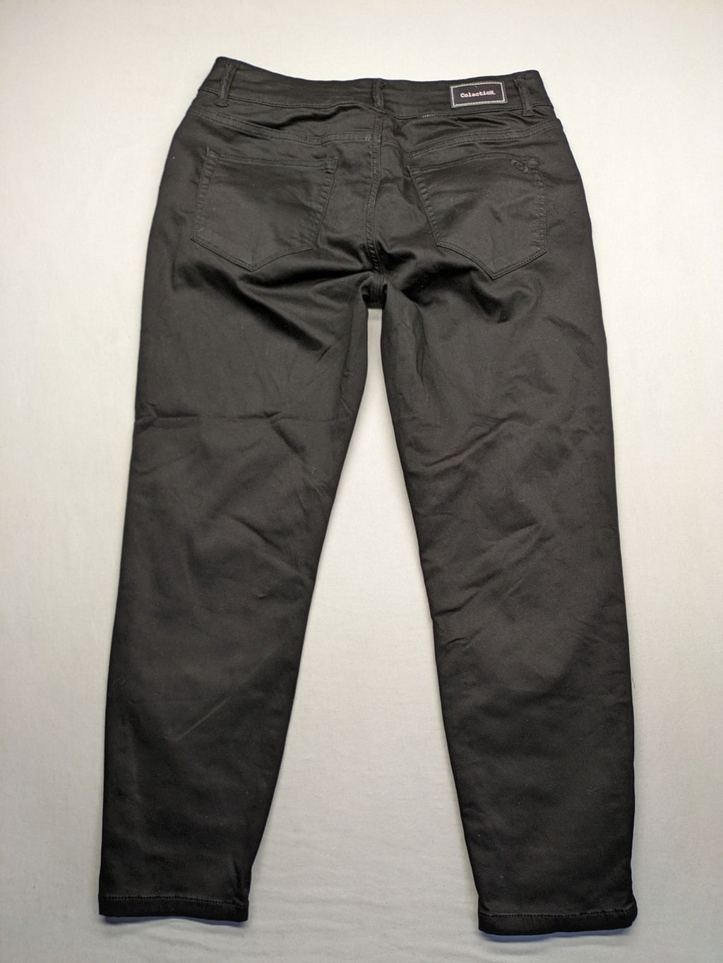 Colac black straight jeans high waist with double button, zipper pockets, and stretch material.