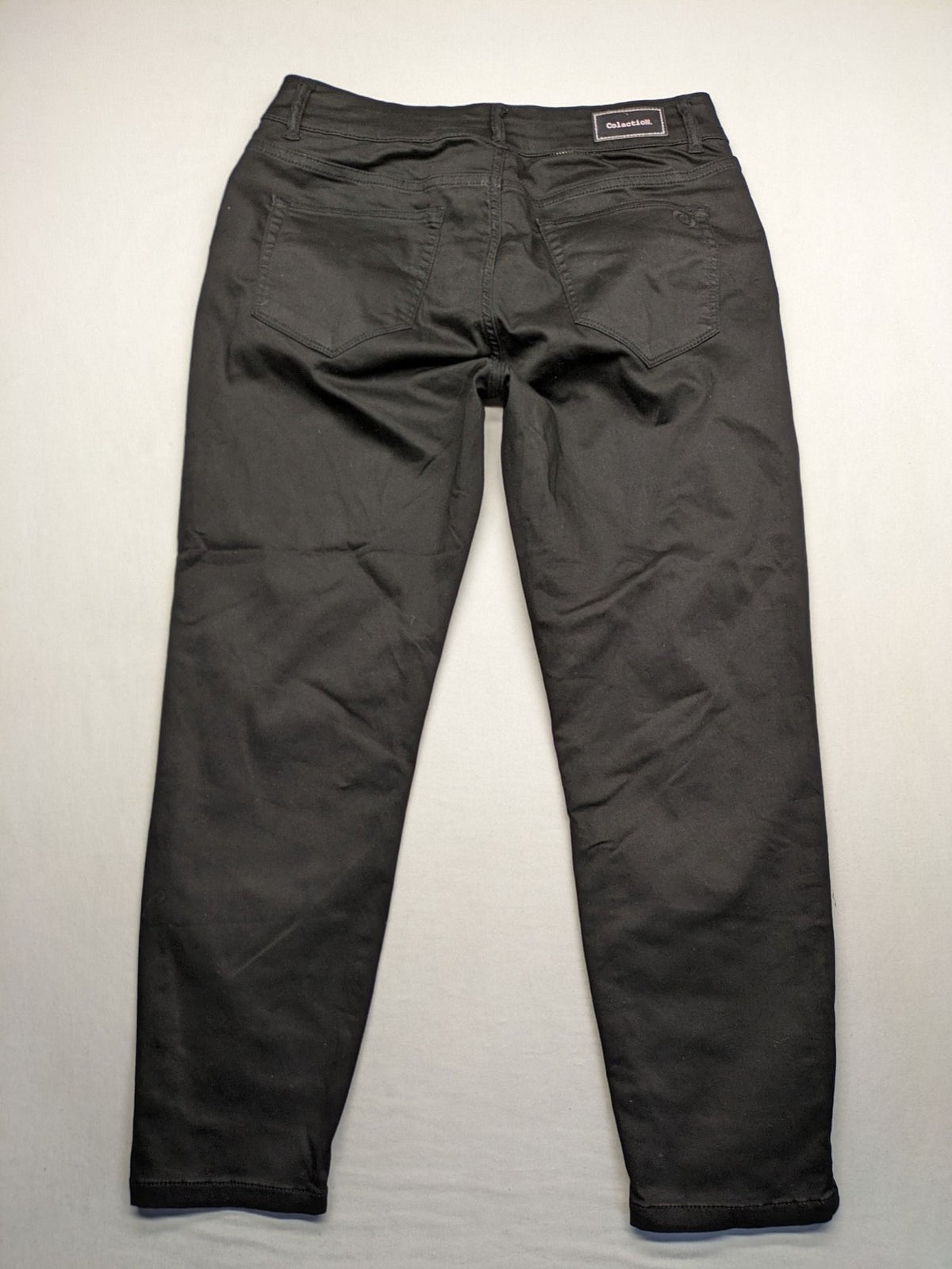 Colac black straight jeans high waist with double button, zipper pockets, and stretch material.