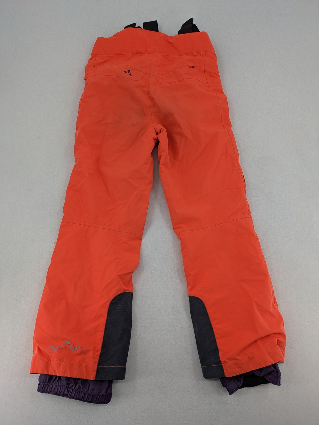 Vaude orange ski pants with logo, Primaloft insulation, and Ceplex Active membrane.