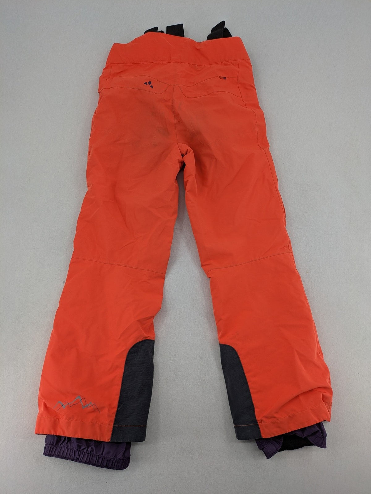 Vaude orange ski pants with logo, Primaloft insulation, and Ceplex Active membrane.