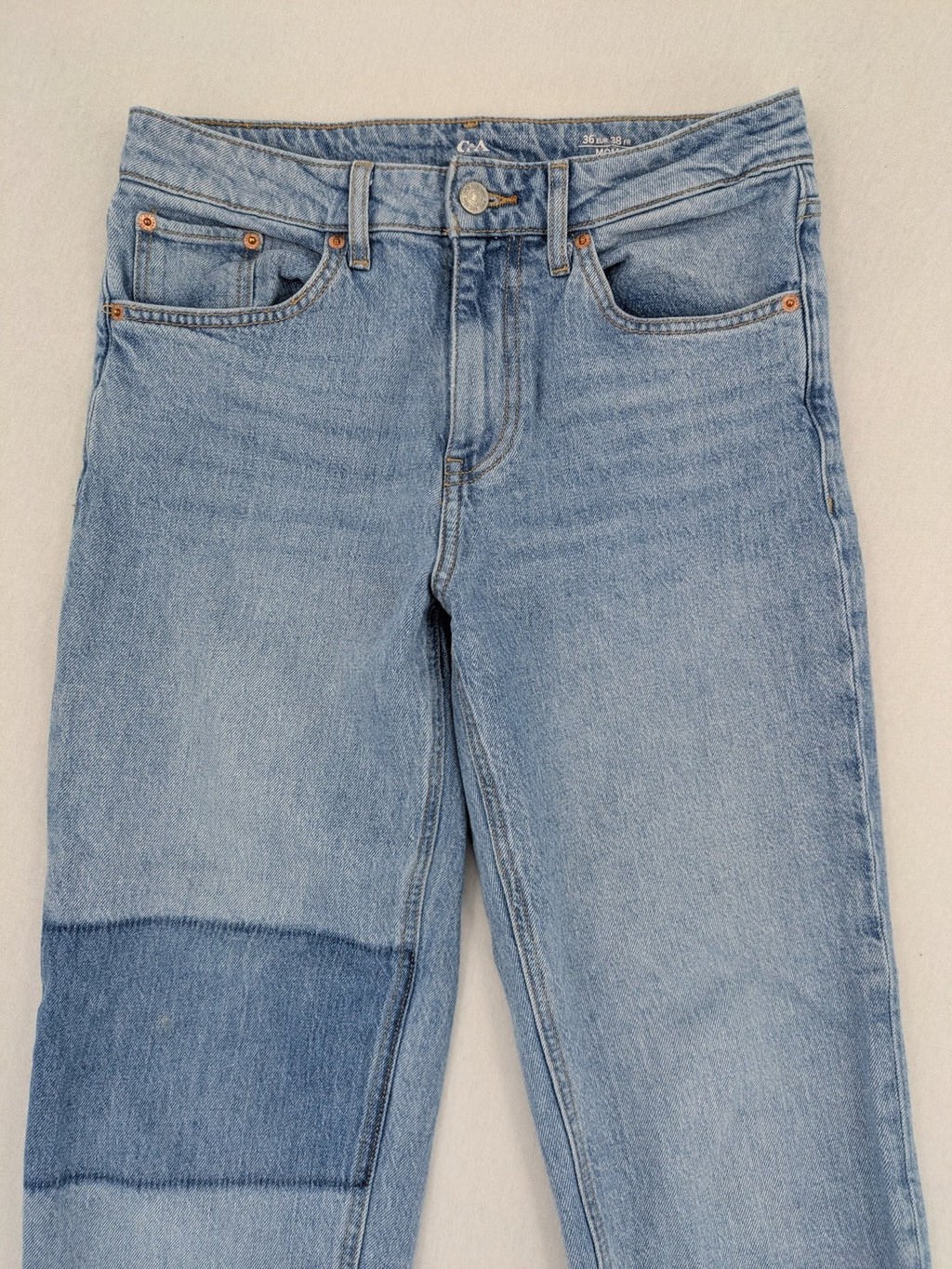 C&A blue mom jeans high waist with unique patchwork design and soft stretch denim.