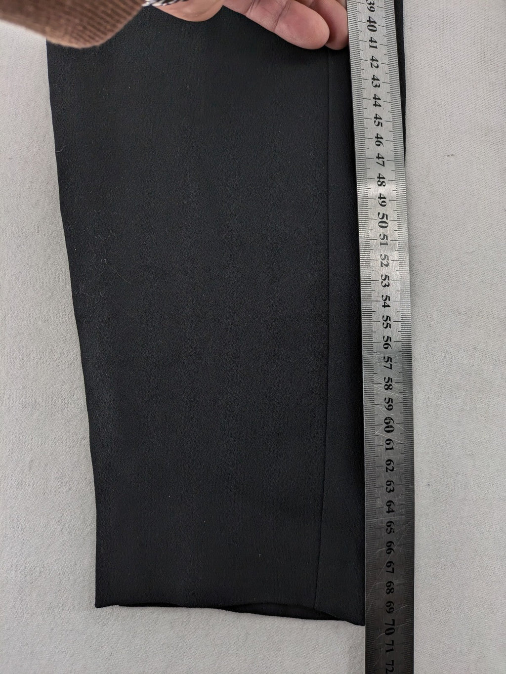 Mango Suit black trousers with zipper, belt loops, and front slant pockets.