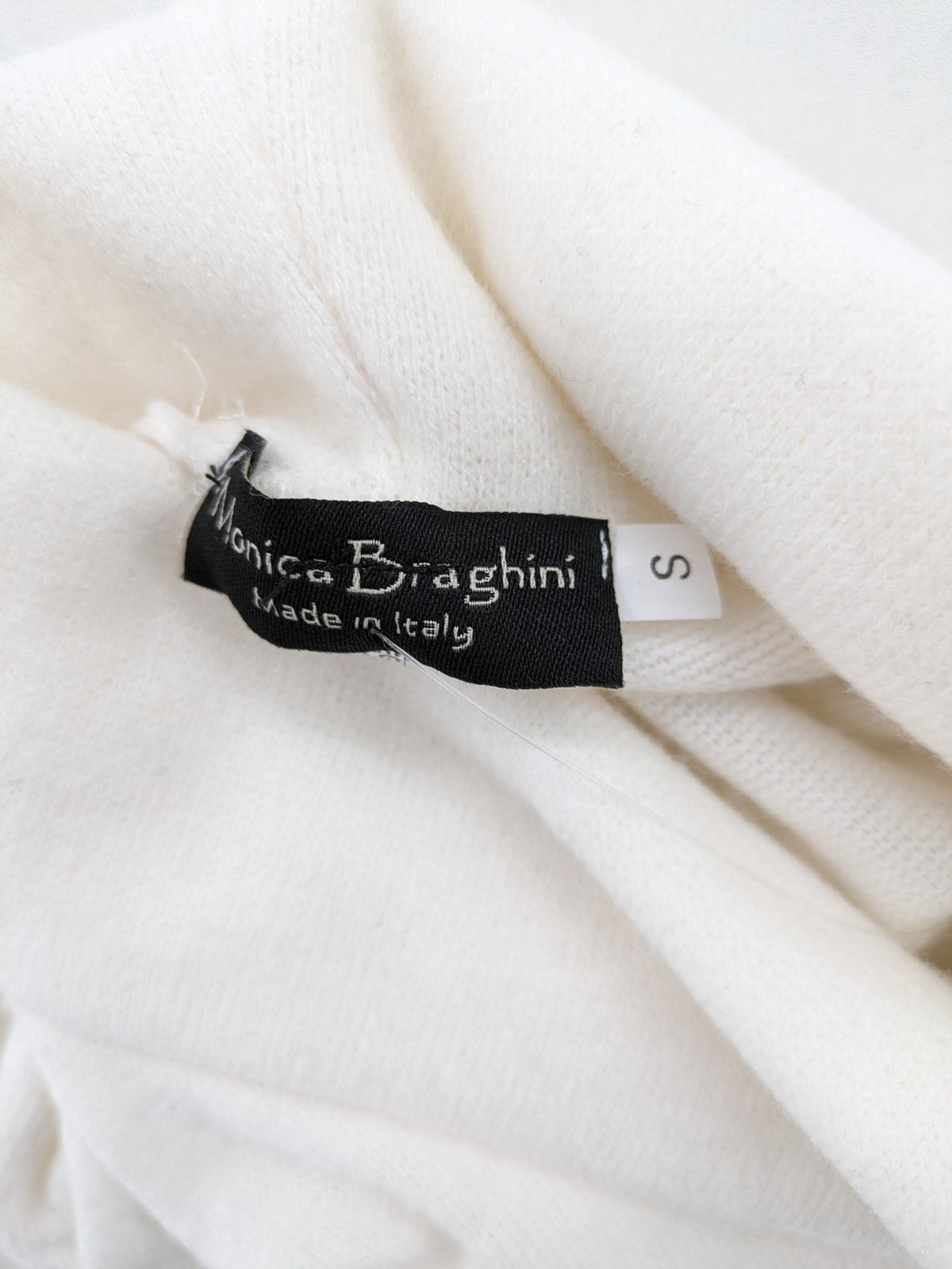 Monica Braghini white turtle neck jumper soft fabric classic design with high collar.