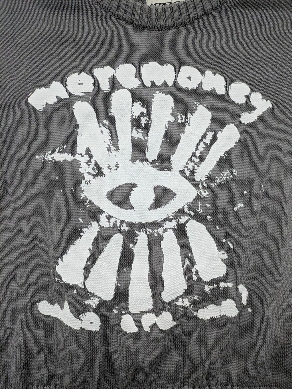 MOREMONEY grey turtle neck jumper with white abstract graphic print and relaxed fit.