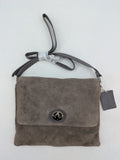 CNTMP grey suede crossbody handbag with flap and silver twist lock closure.