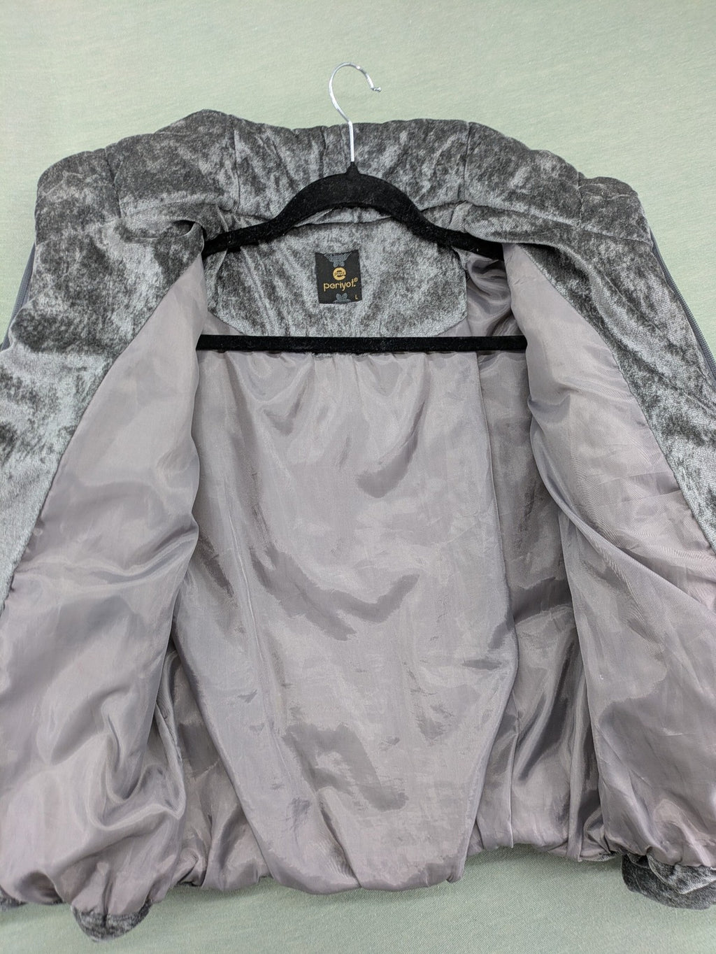 Periot grey puffer jacket with high collar and O-ring zipper detail in velvet texture.