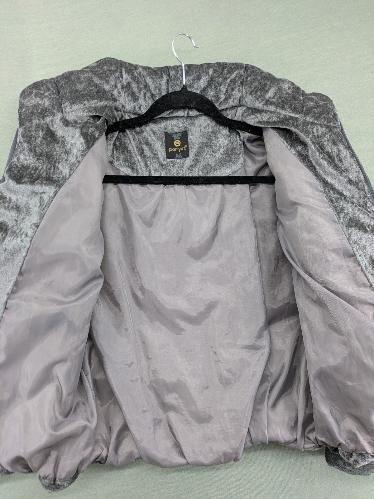 Periot grey puffer jacket with high collar and O-ring zipper detail in velvet texture.