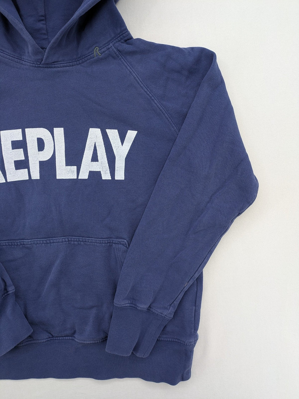 Replay blue turtle neck jumper with large logo print and kangaroo pocket, 100% cotton.
