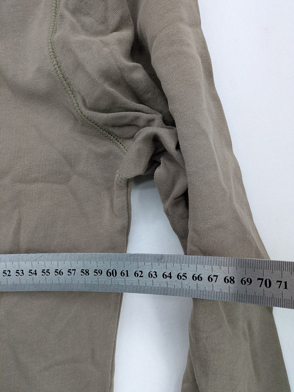 Tony Brown brown turtle neck jumper with embroidered logo and zip button placket.