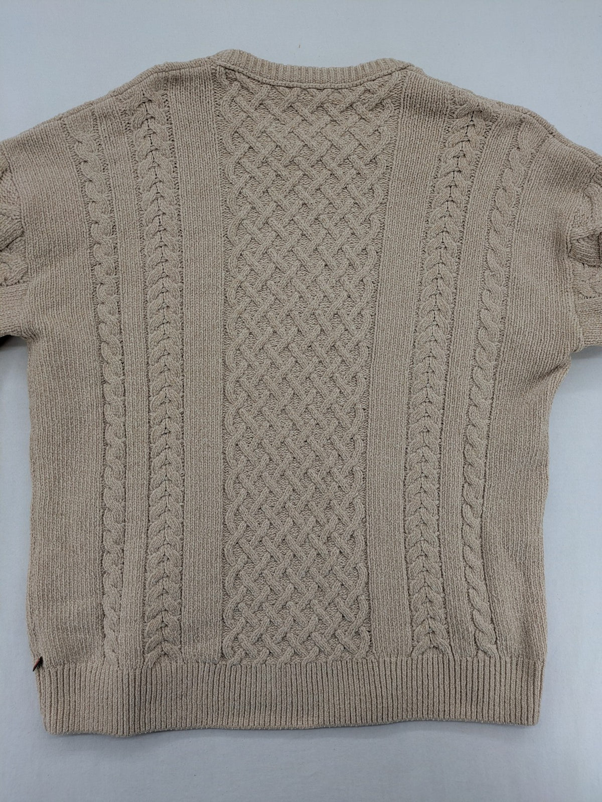 Scotch & Soda beige turtle neck jumper with intricate cable knit pattern.