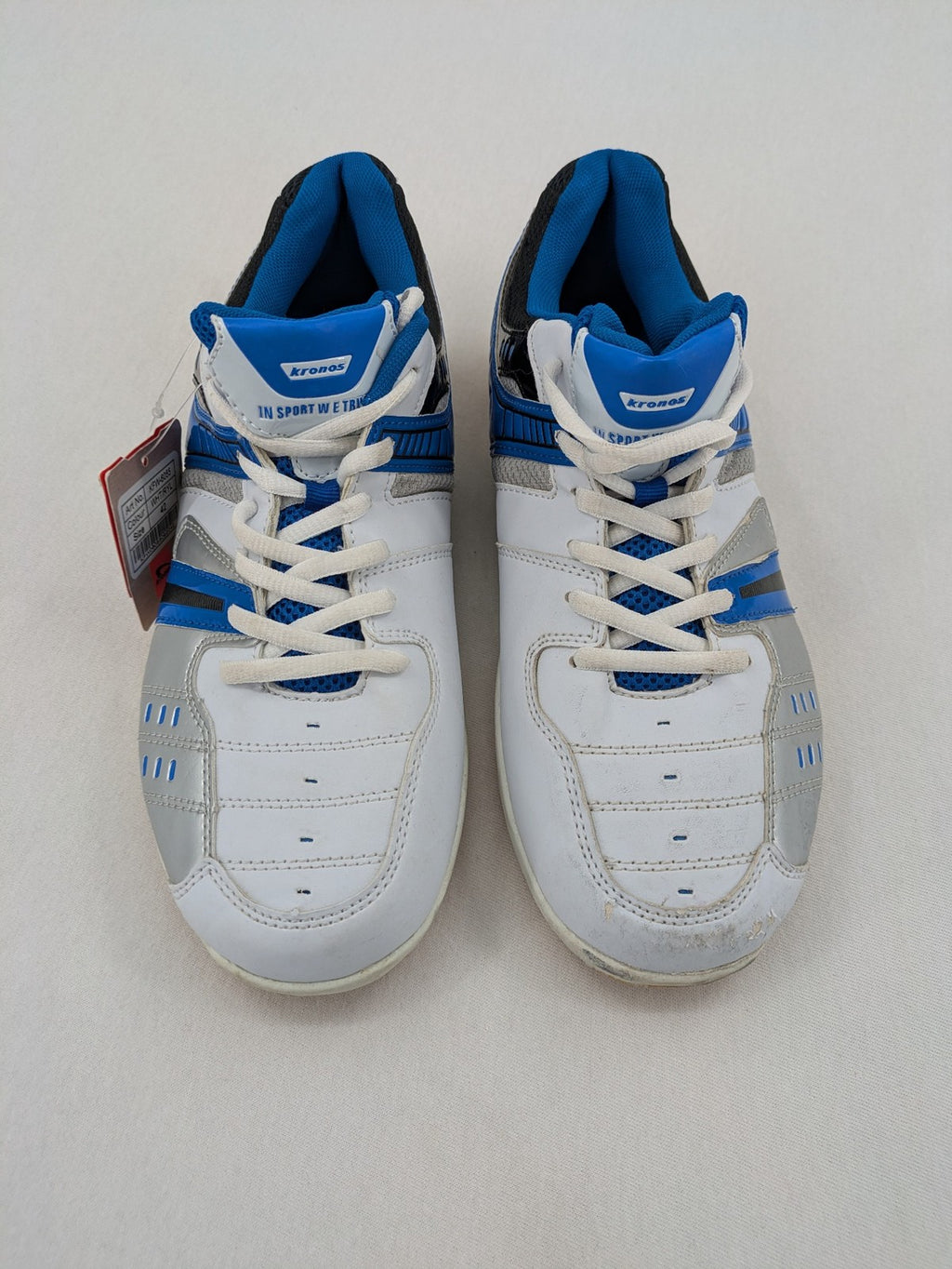 Kronos sports sneakers white, blue, and silver with durable rubber sole and classic design.