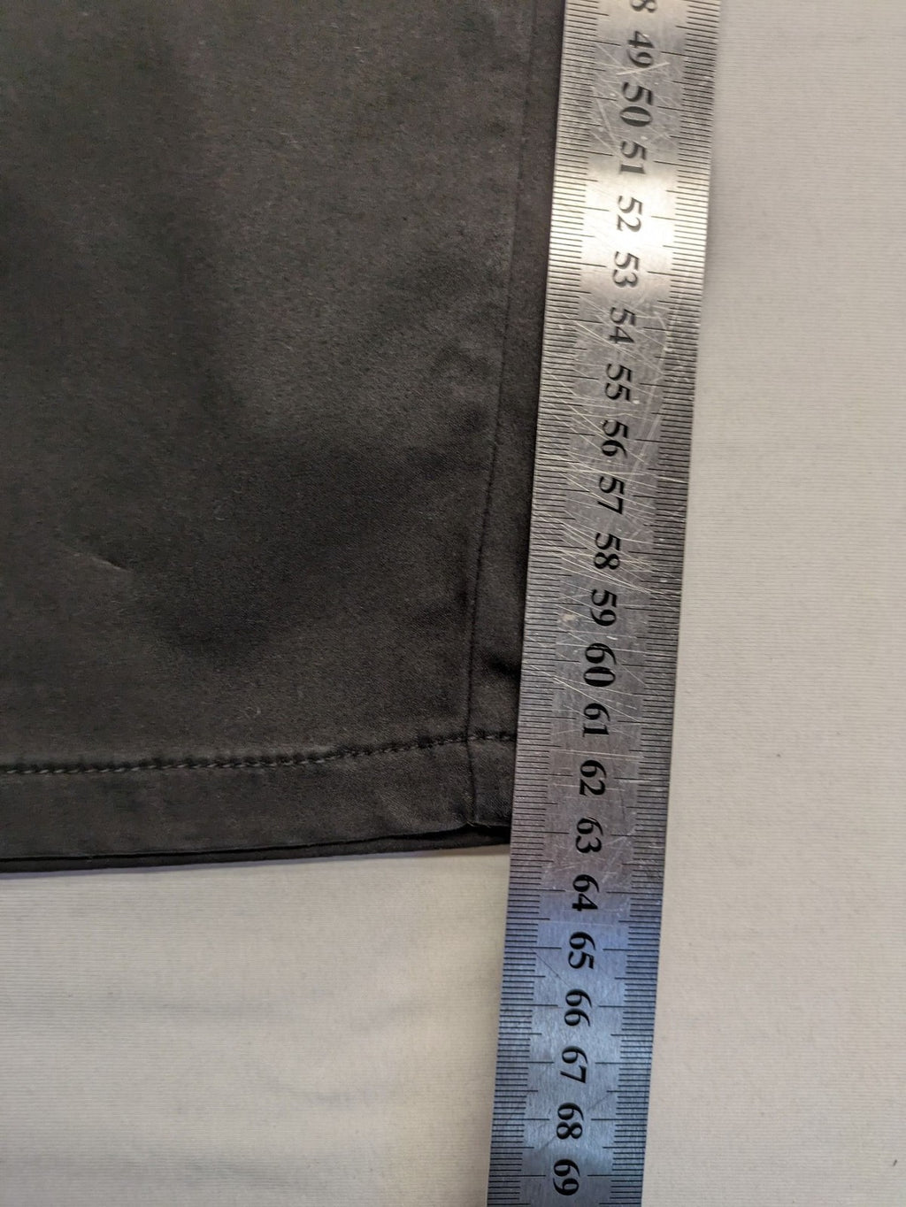 Colac black straight jeans high waist with double button, zipper pockets, and stretch material.