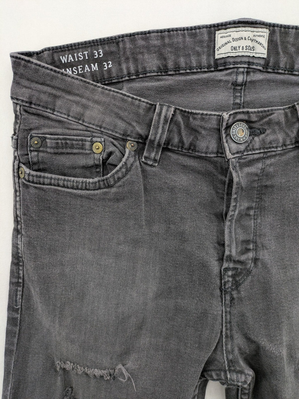 Only & Sons grey slim fit jeans with ripped details and open hem, stretch denim.