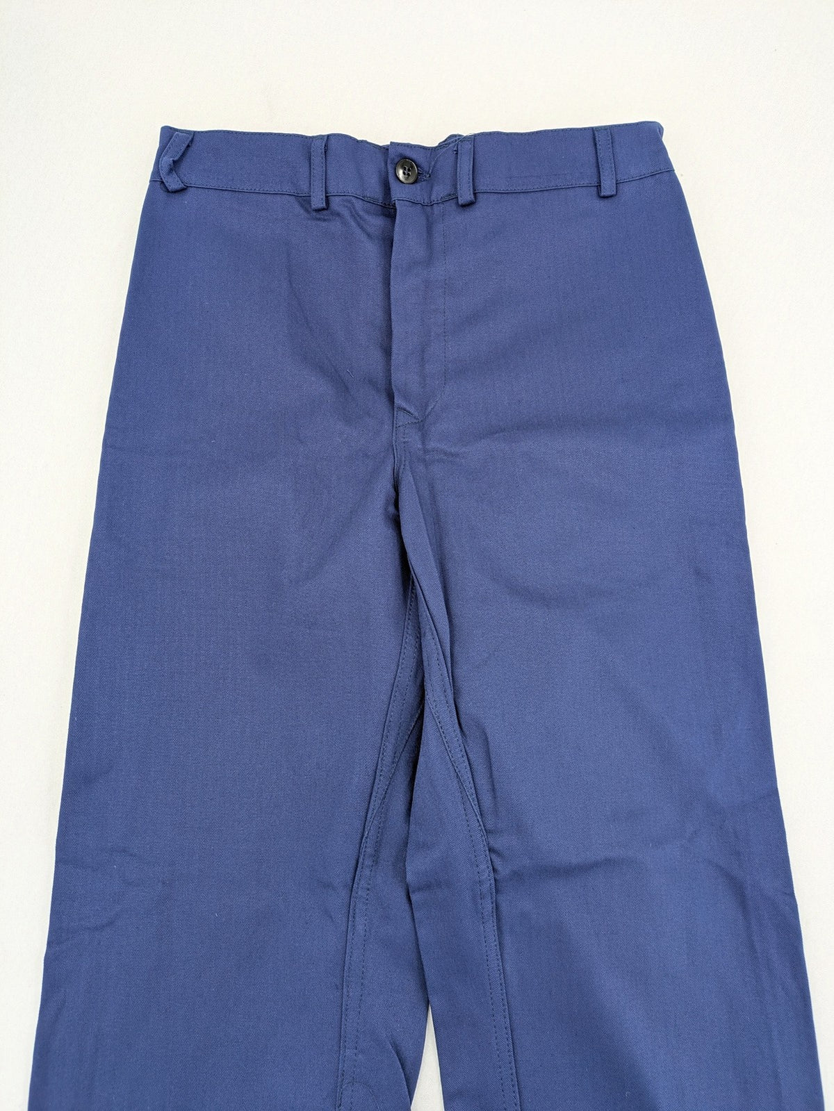 Uvex navy work trousers 100% cotton with button closure and belt loops.