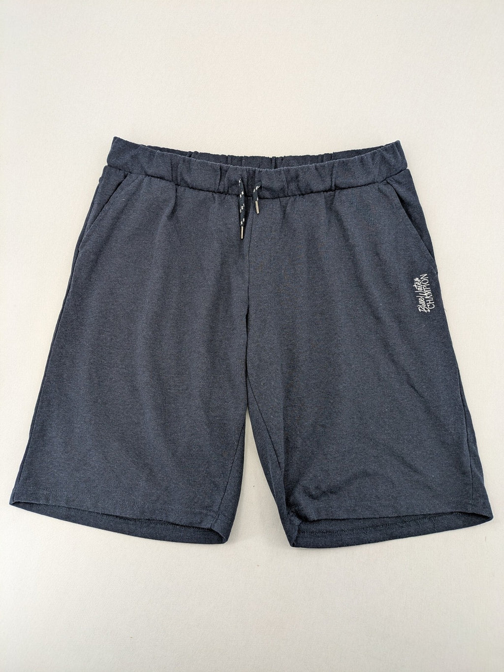 Livergy blue sweatshorts with embroidered "Blue Water Champion" logo and adjustable drawstring.