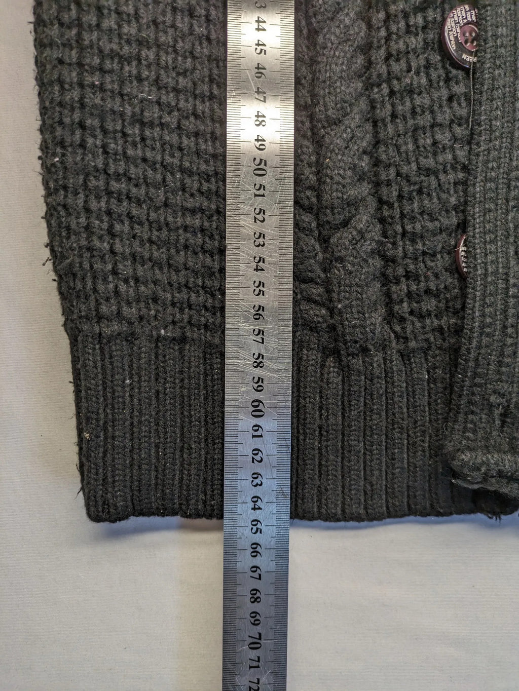 SCD Green grey turtle neck jumper with cable knit pattern and dual closure.