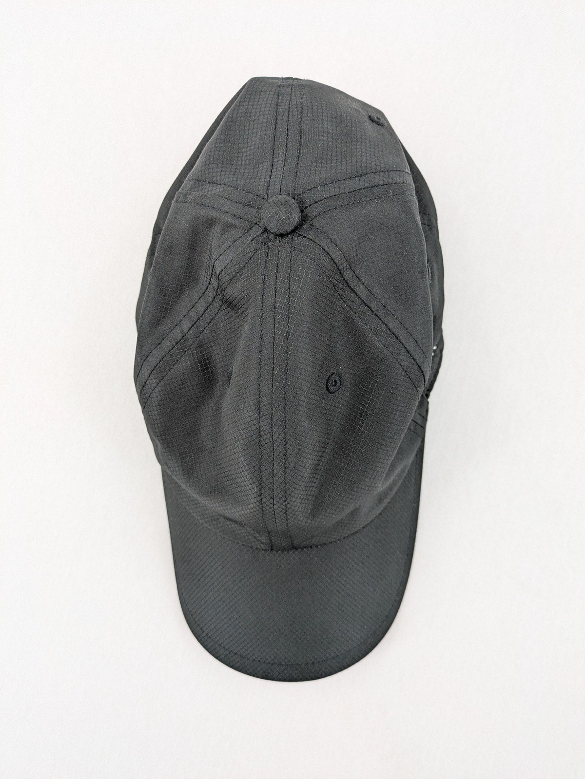 Dormakaba grey baseball cap 6-panel design with white embroidered logo and adjustable strapback.