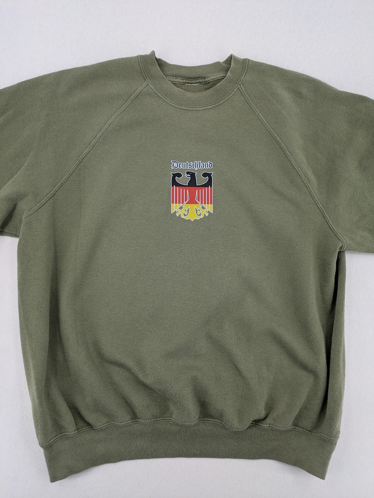 Vintage Deutschland turtle neck jumper khaki with eagle crest and raglan sleeves.