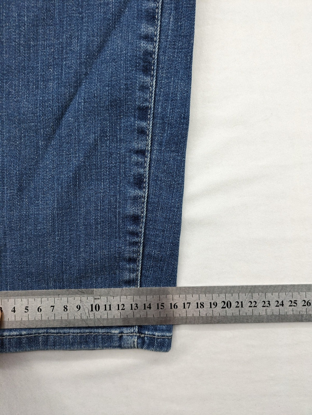 Gerry Weber blue straight jeans with decorative rhinestone appliqués and stretch denim material.