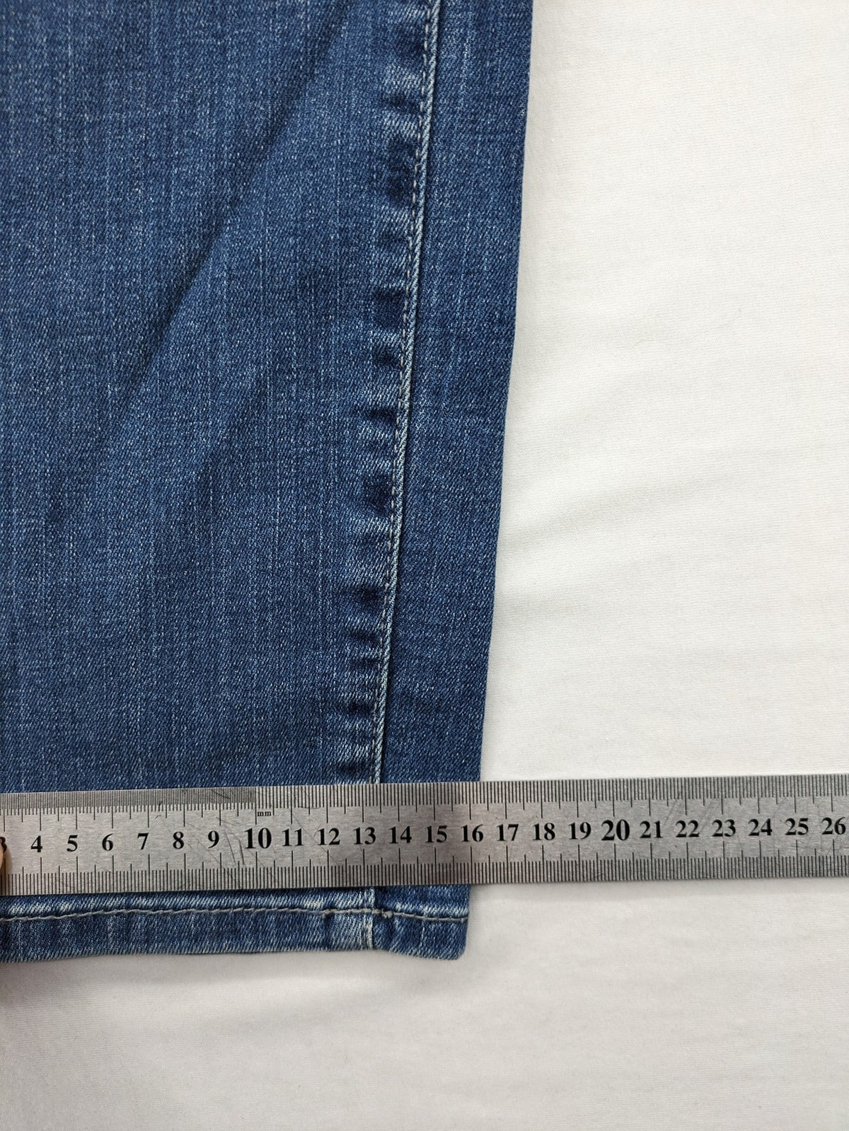 Gerry Weber blue straight jeans with decorative rhinestone appliqués and stretch denim material.
