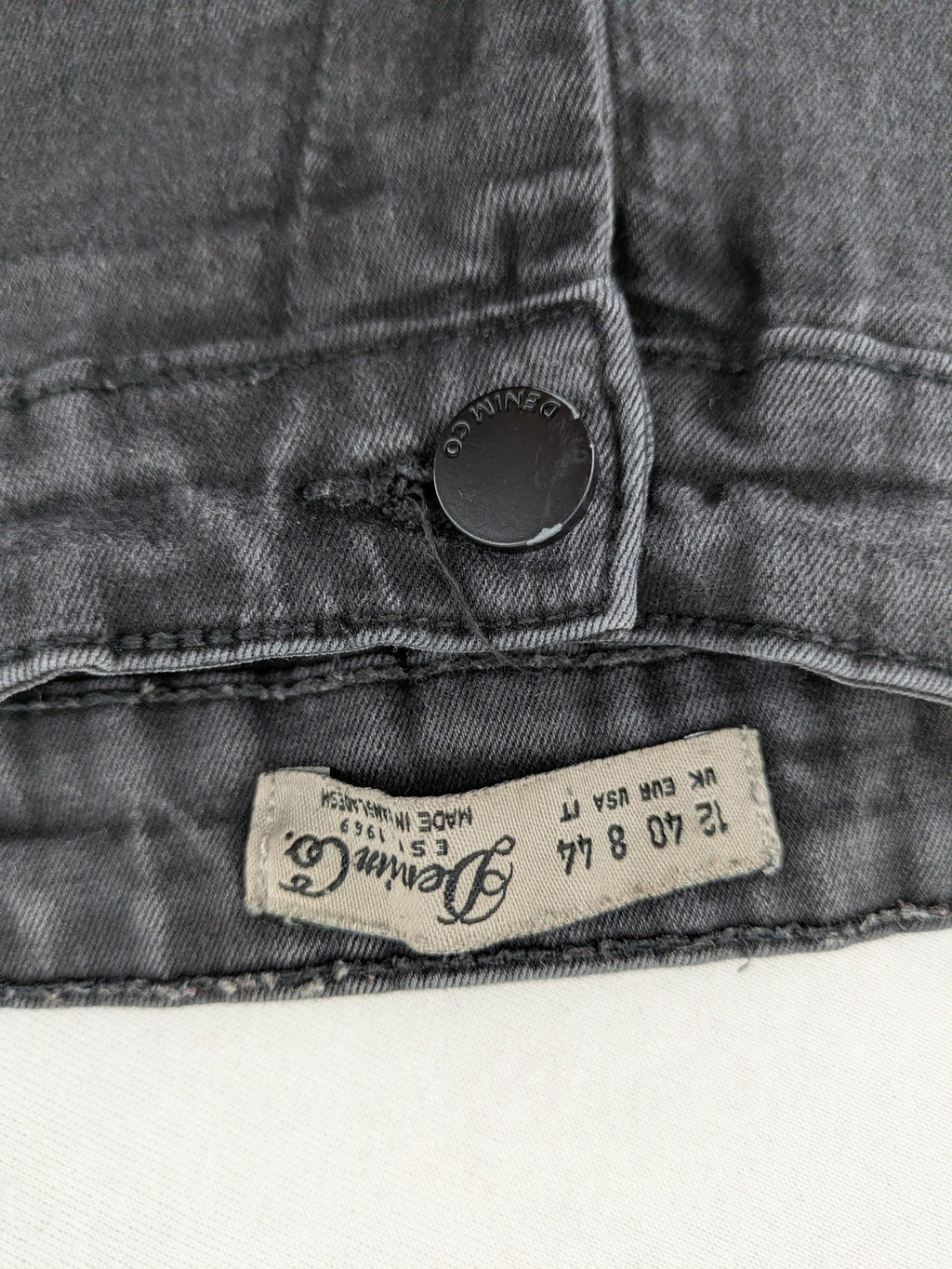 Denim & Co. black skinny jeans high waist stretch denim with washed finish.