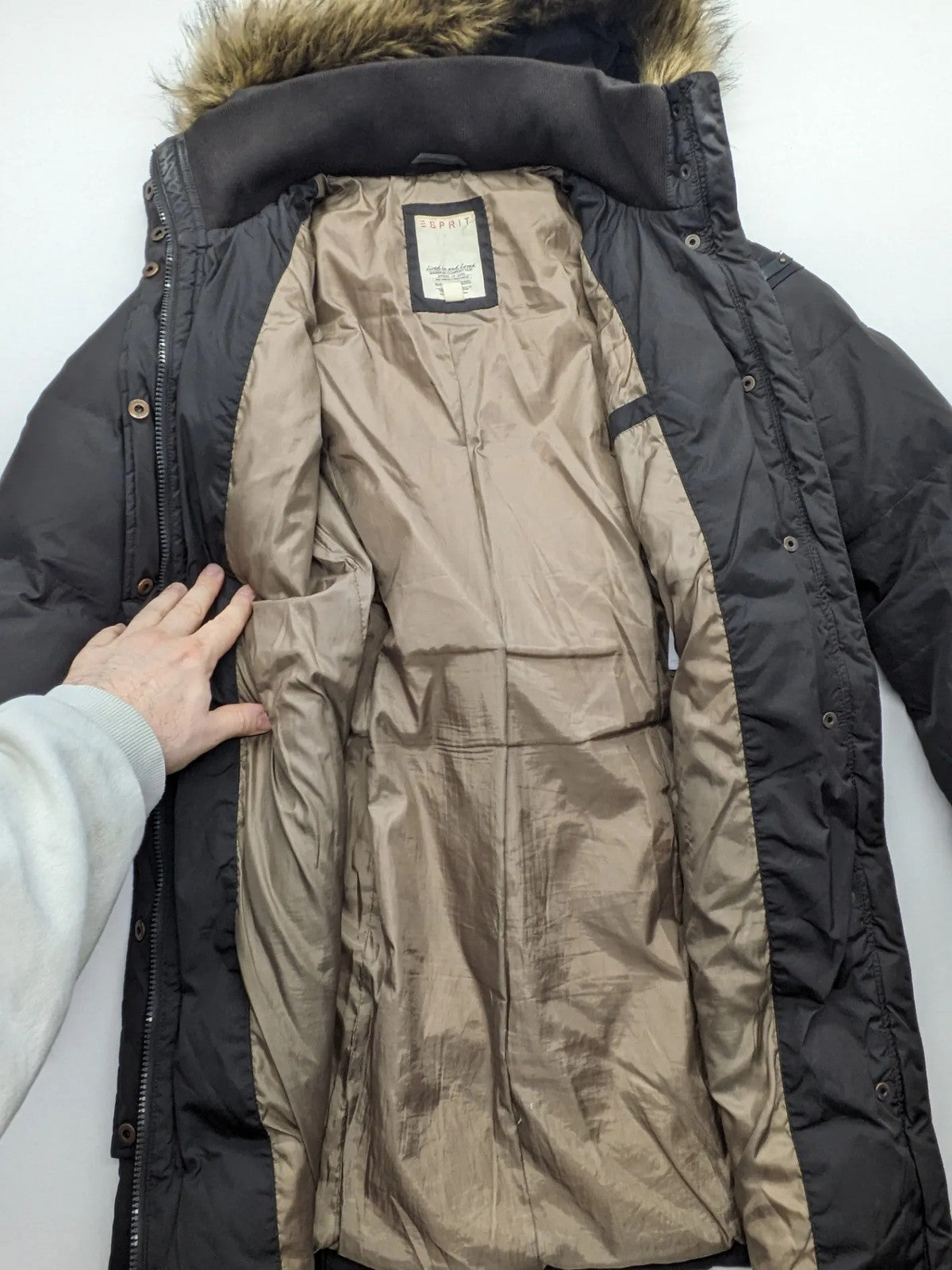 Esprit black quilted coat with removable faux fur hood and elastic waist belt.