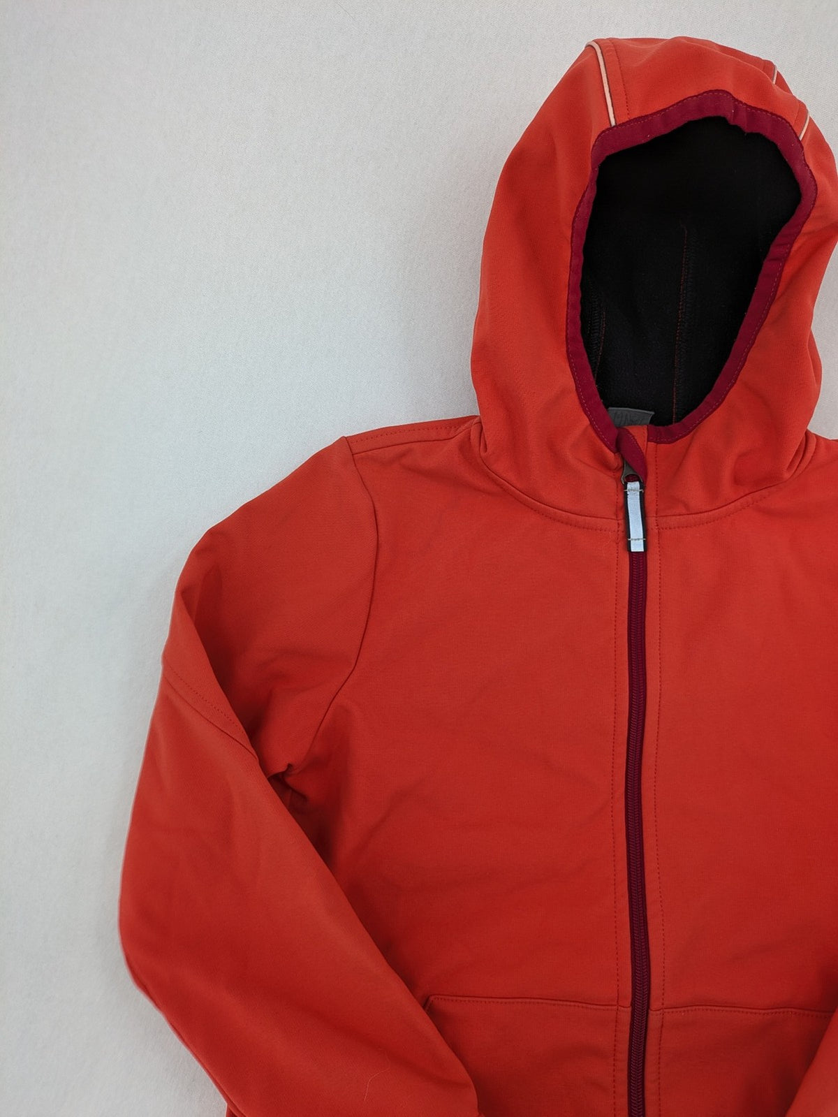 elkline orange softshell coat with fleece lining and elk logo patch