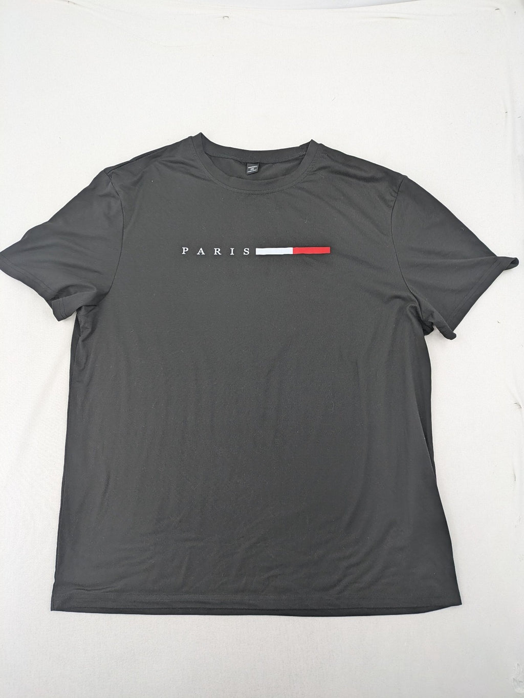 Manfinity loungewear set black T-shirt and shorts with Paris graphic print.