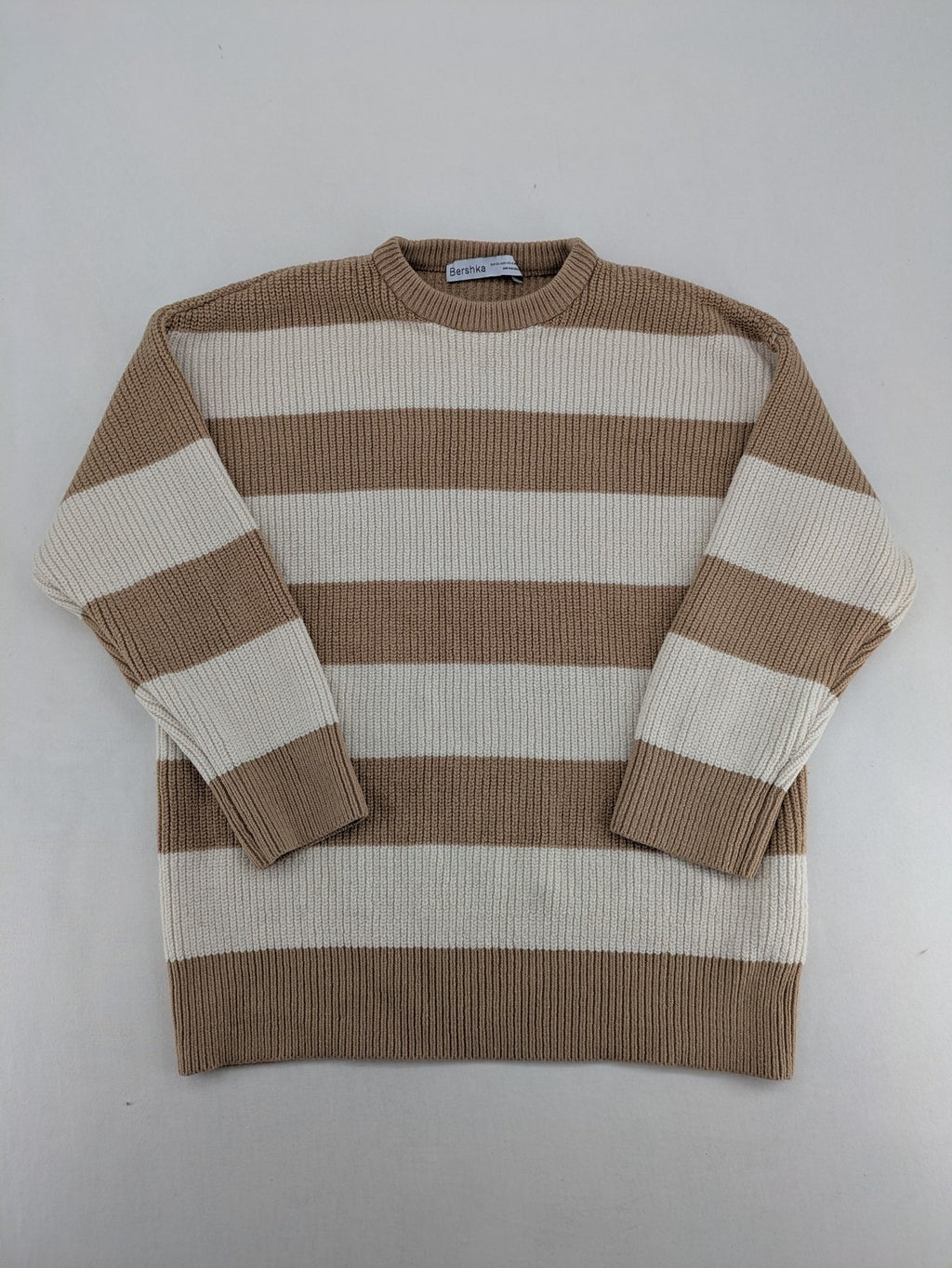 Bershka cream turtle neck jumper with brown and white striped pattern in ribbed knit.