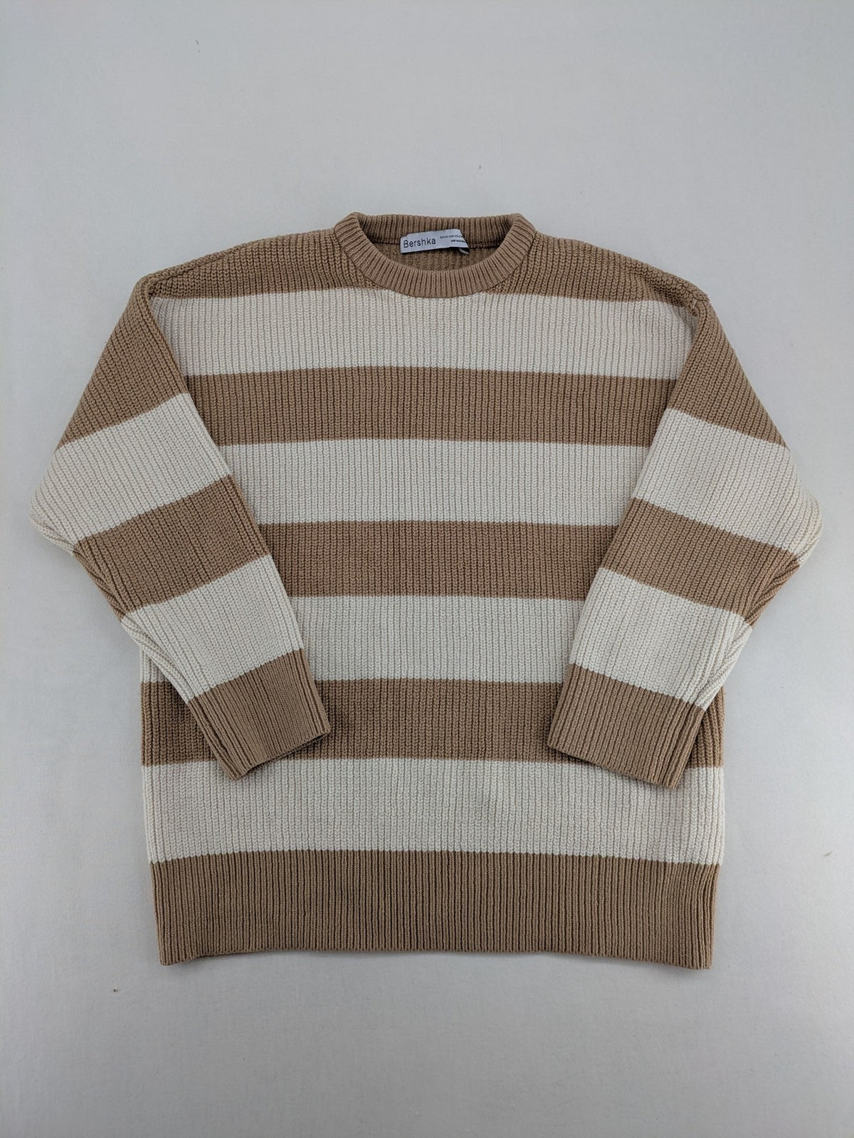 Bershka cream turtle neck jumper with brown and white striped pattern in ribbed knit.