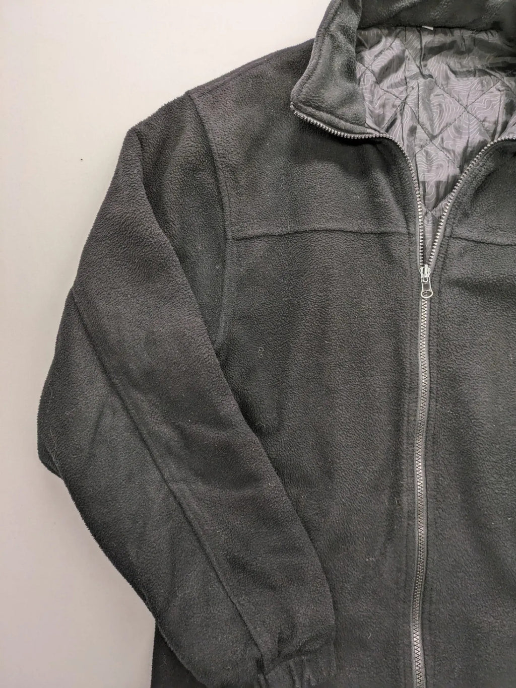 New Feeling black outdoor jacket XXL, fleece material, zip closure, side pockets, waterproof.