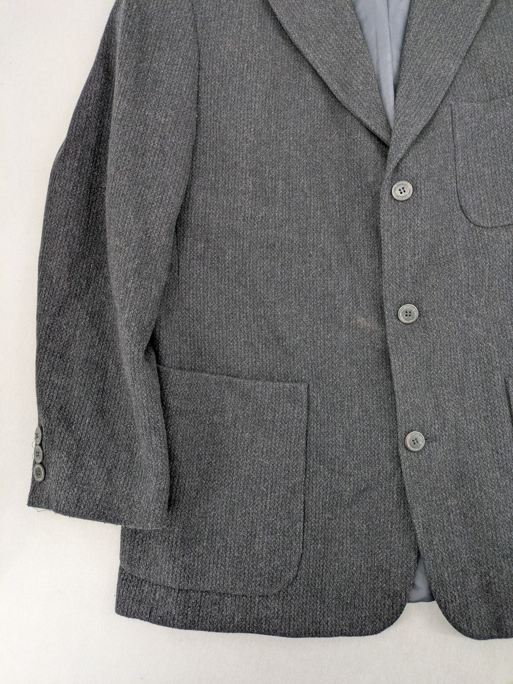 Camel Collection grey blazer three-button front with patch pockets, made from wool blend.