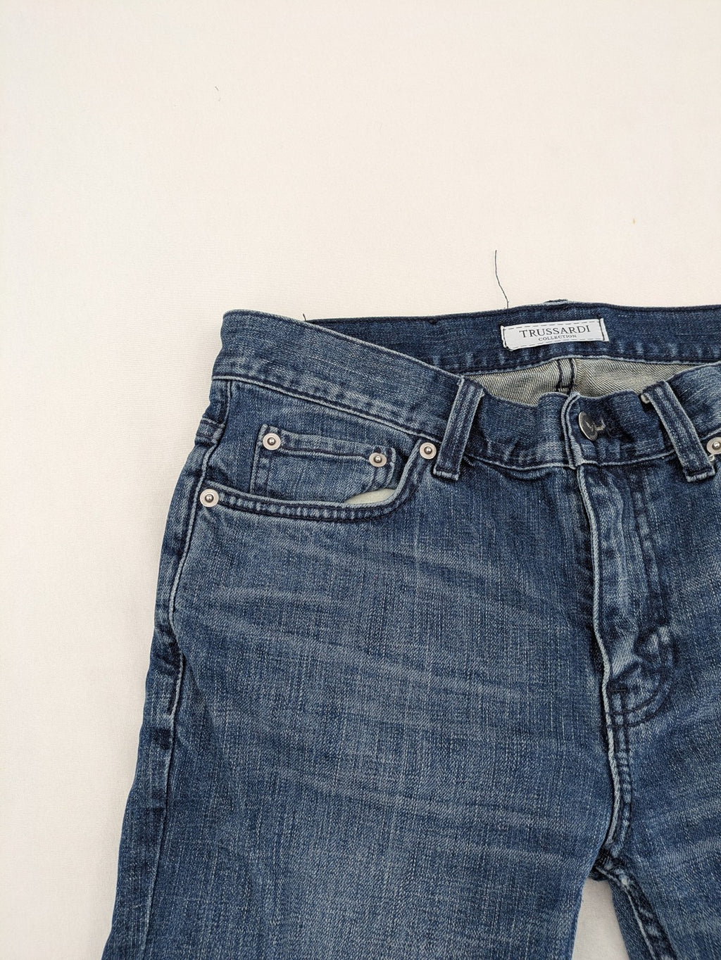 Trussardi blue straight jeans with classic 5-pocket design and durable denim material.