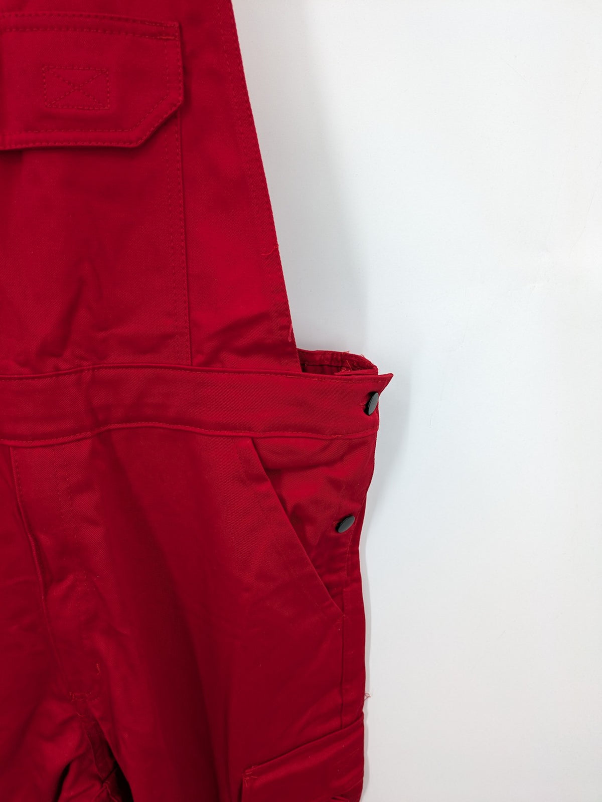 Stonekit red work overalls cotton with adjustable straps and multiple cargo pockets.