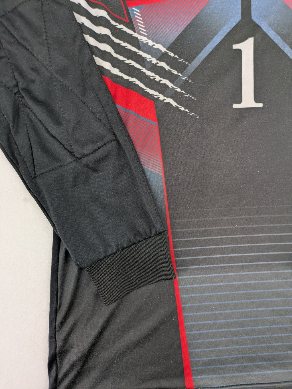 uhlsport long sleeve goalkeeper jersey black with red and blue accents, padded elbows, number 1
