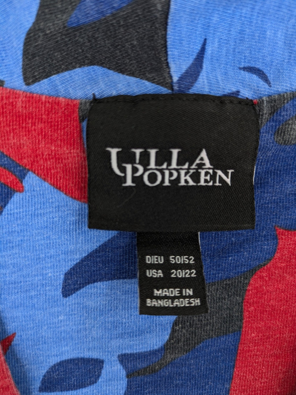 Ulla Popken blue top with floral print, V-neck, 3/4 sleeves, soft cotton blend.