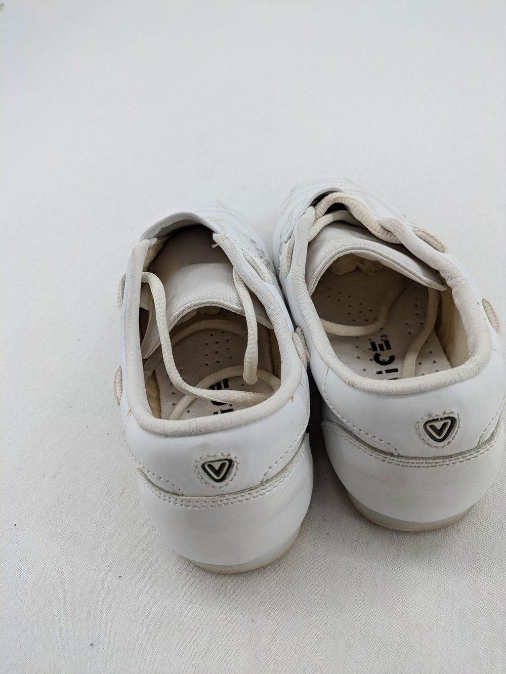 Venice low-top sneakers beige and white with rhinestone embellishments and unique sole pattern.