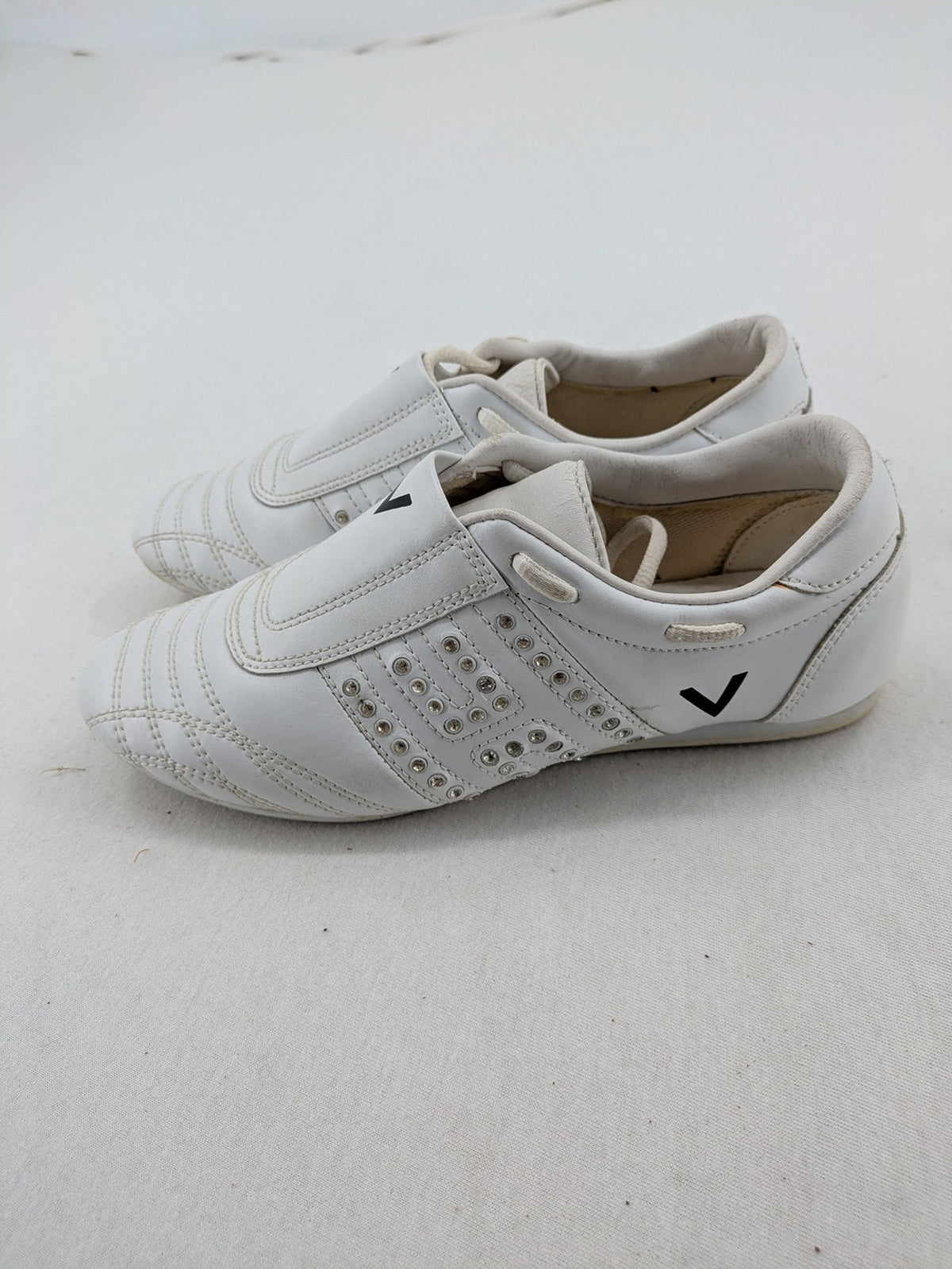 Venice low-top sneakers beige and white with rhinestone embellishments and unique sole pattern.