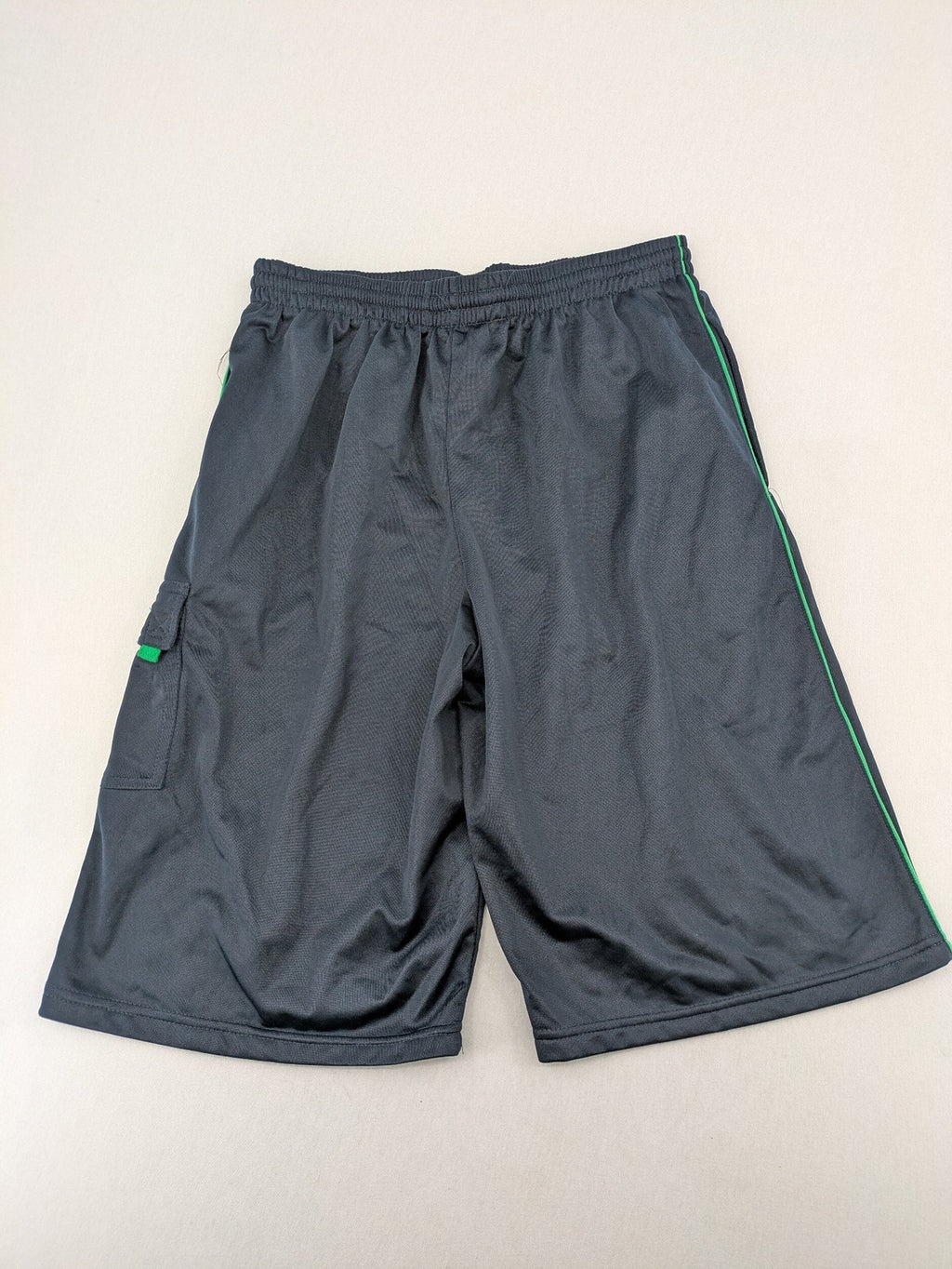 okay grey cargo shorts with green "ATHL. 5 DIVISION" graphic print and side pocket.