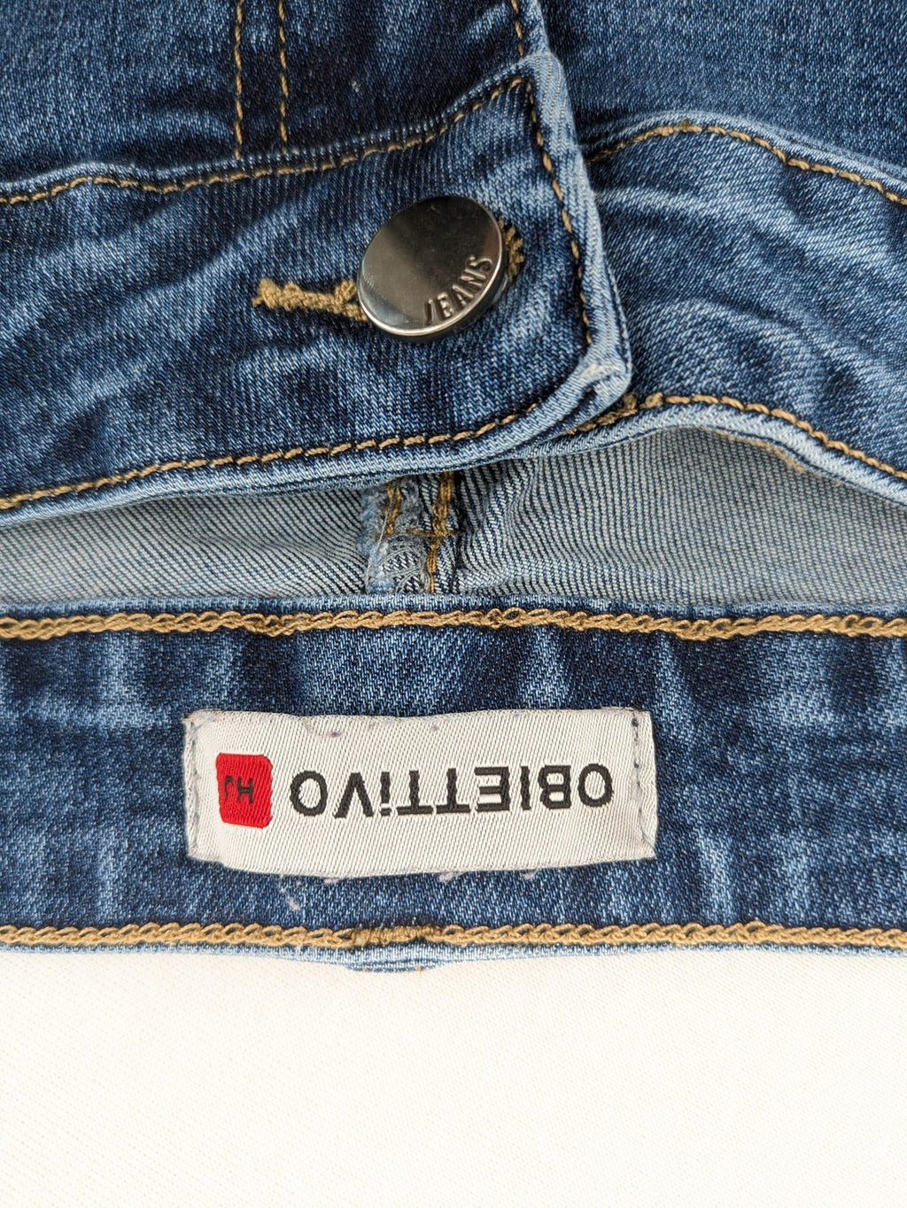 Obiettivo blue bootcut jeans 5-pocket design, comfortable stretch denim, classic medium wash.