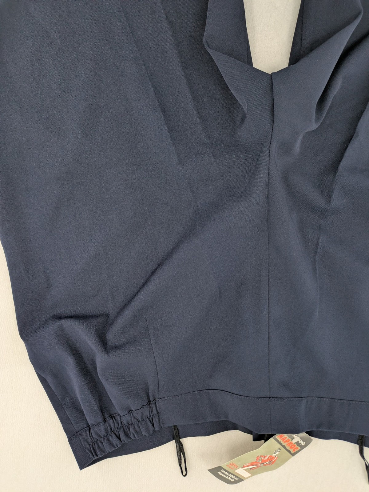 Baumwolle navy motorcycle pants with elastic waistband and classic straight cut design.