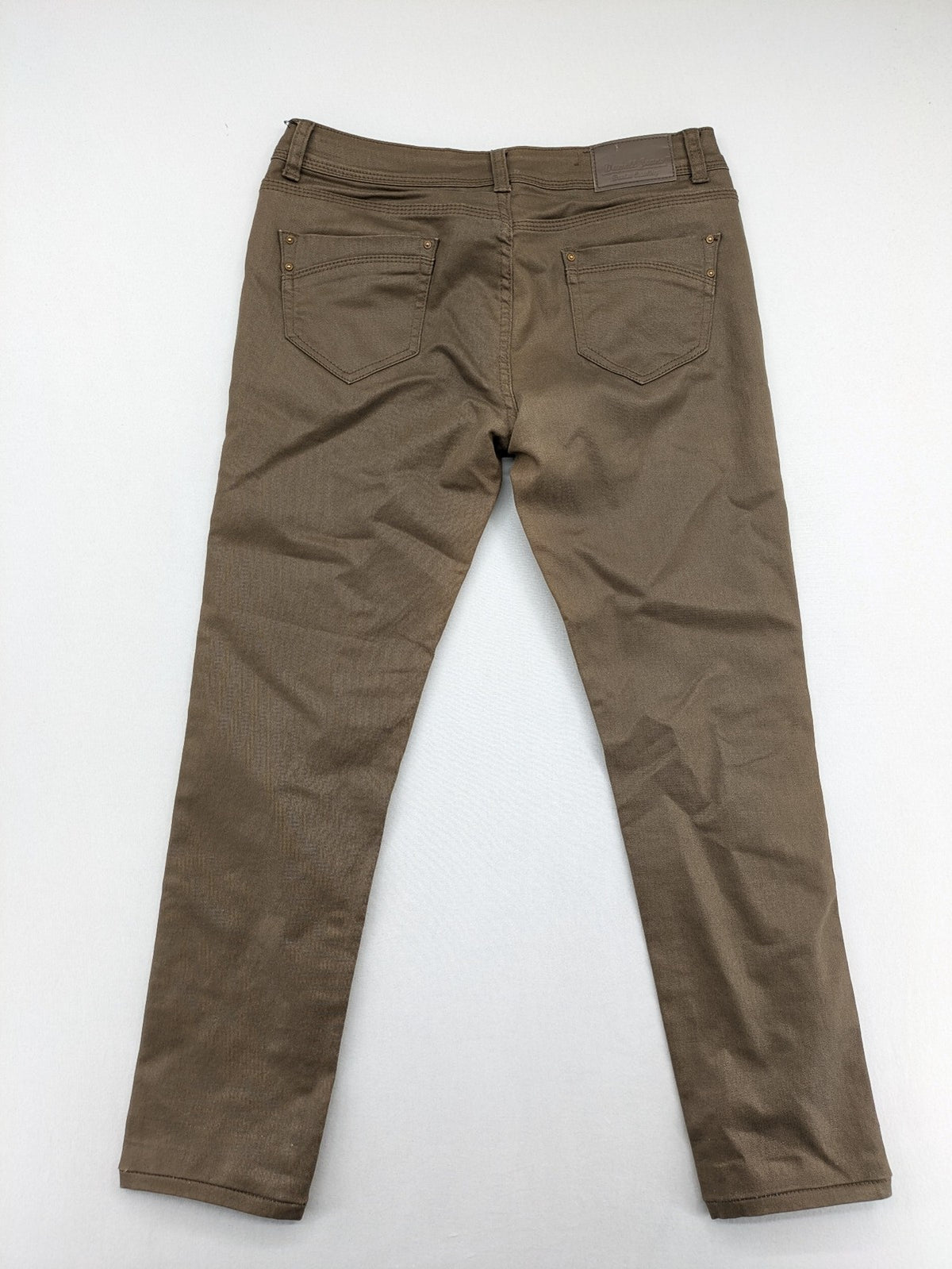 Vavell khaki skinny jeans five-pocket design with unique front zipper detail.