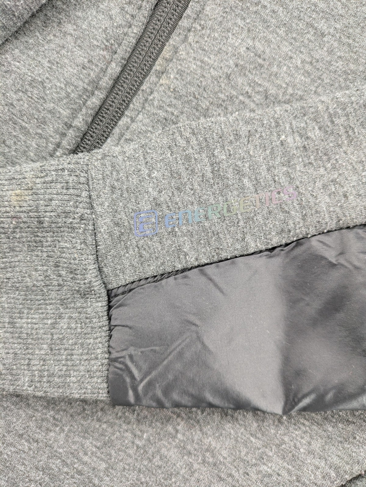 Energetics hybrid jacket black grey with High Peak patch and zip-up design.