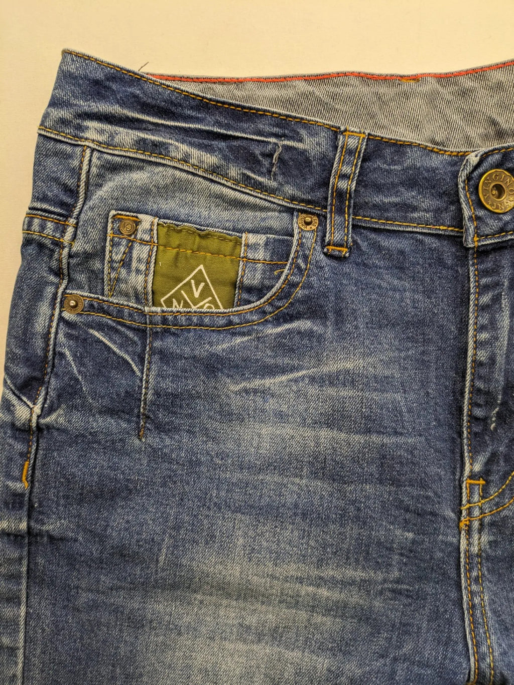 Vingino blue skinny jeans with adjustable waistband and classic wash, made from stretch denim.